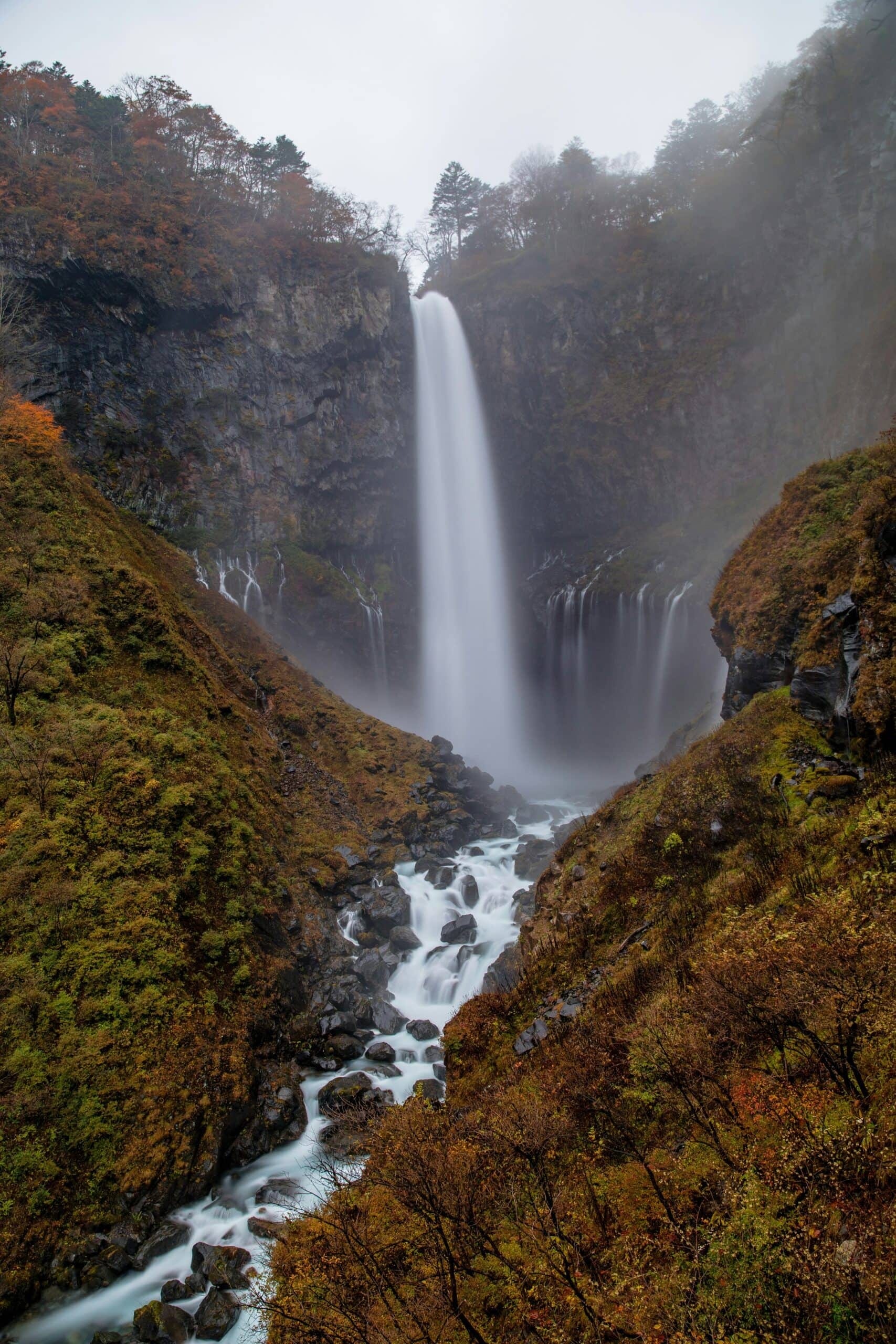 Kegon waterfall near Nikko in autumn, the main fall and twelve secondary cascades visible at the base of the gorge