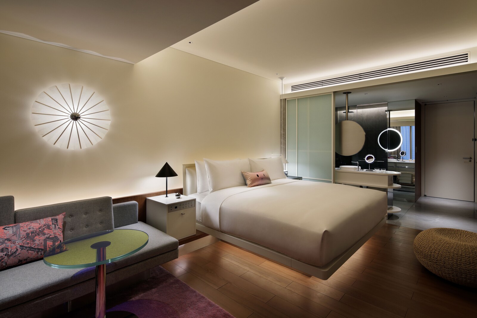A design-forward guestroom at W Osaka with bold contemporary interiors