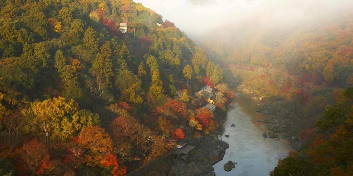 The riverside approach to Hoshinoya Kyoto, reached by private boat
