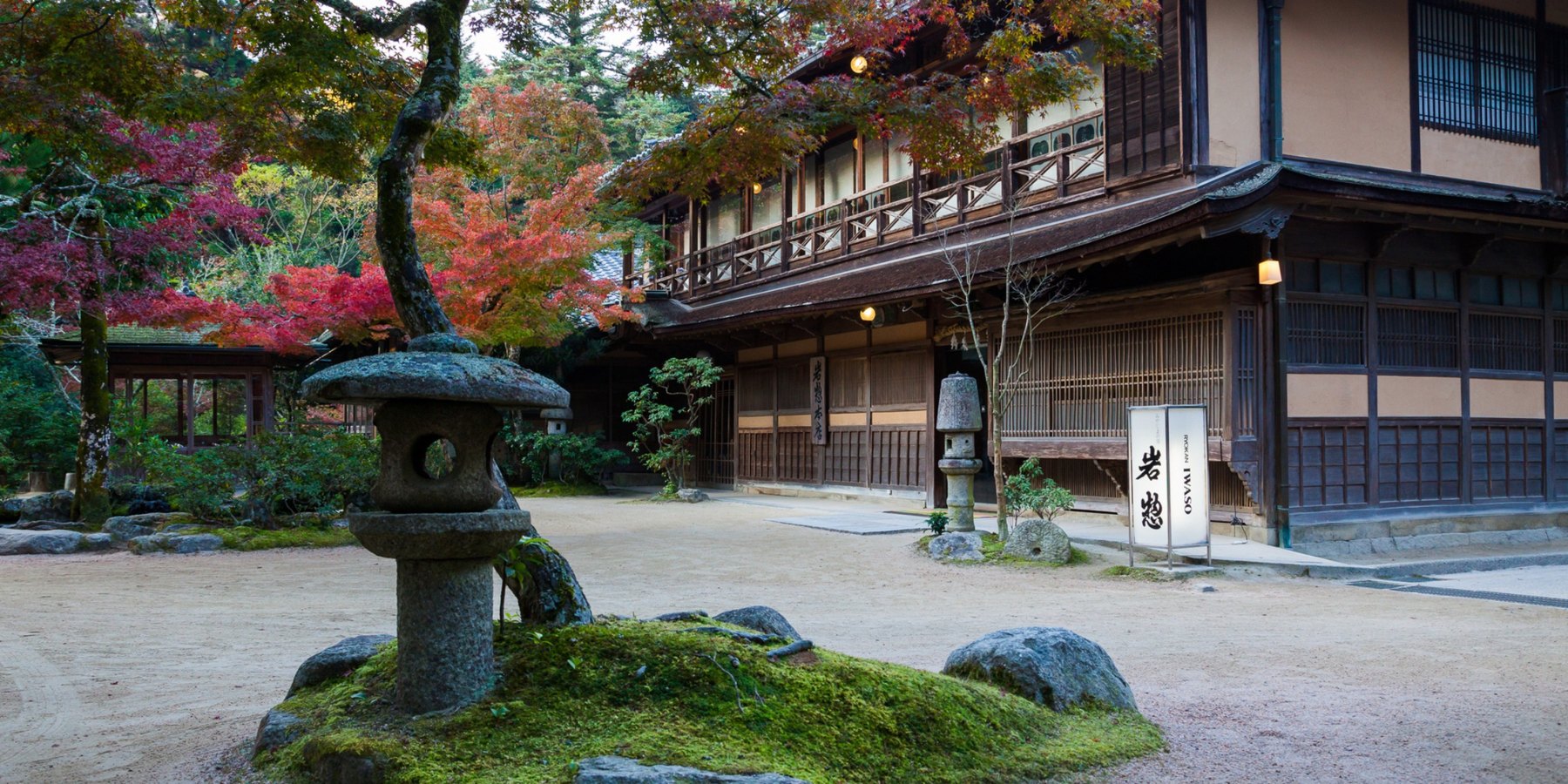 The wooden inn Iwaso among autumn maples on Miyajima