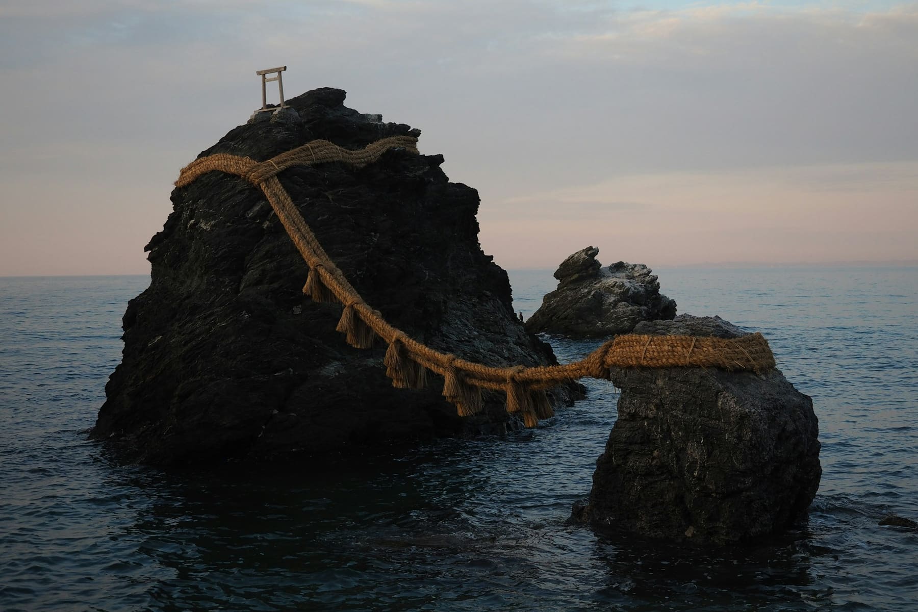 Meoto Iwa, the wedded rocks joined by a rope in the sea