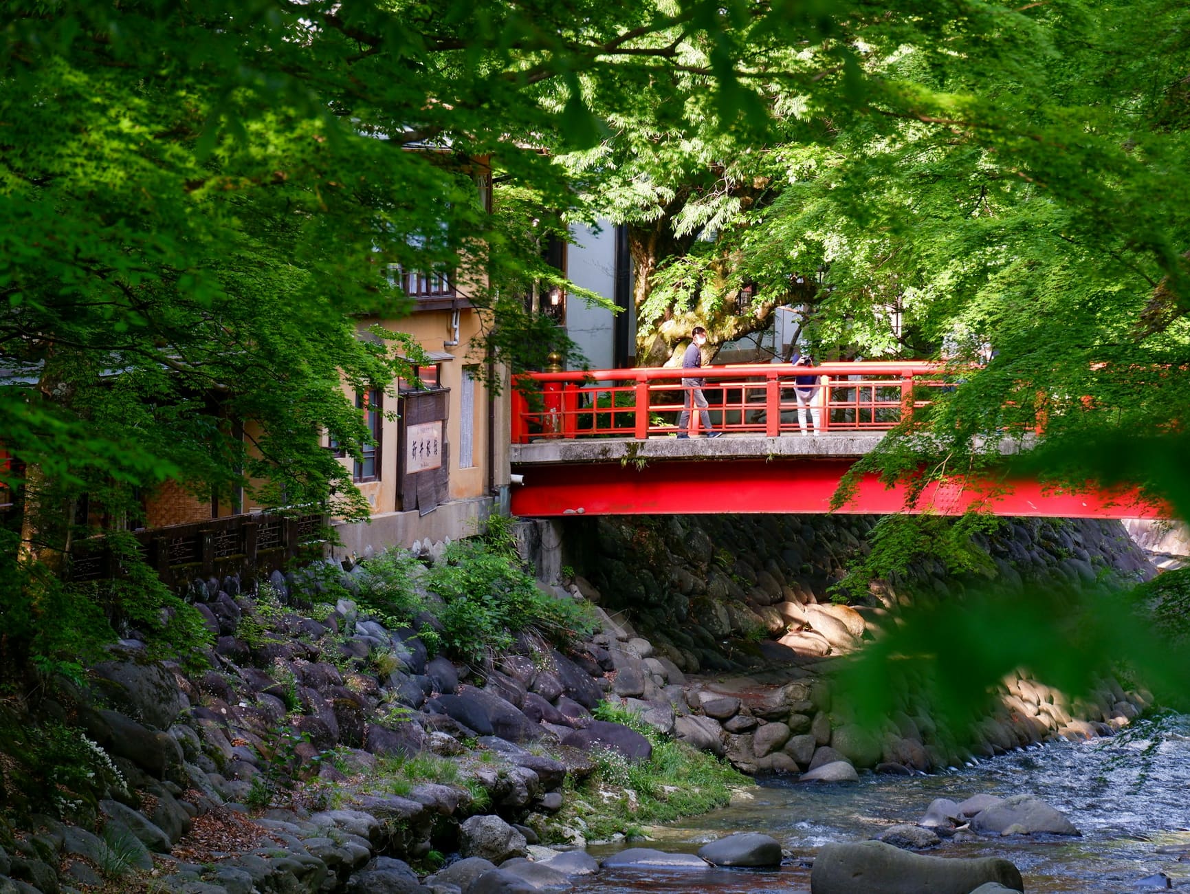 A red bridge over the river in Shuzenji
