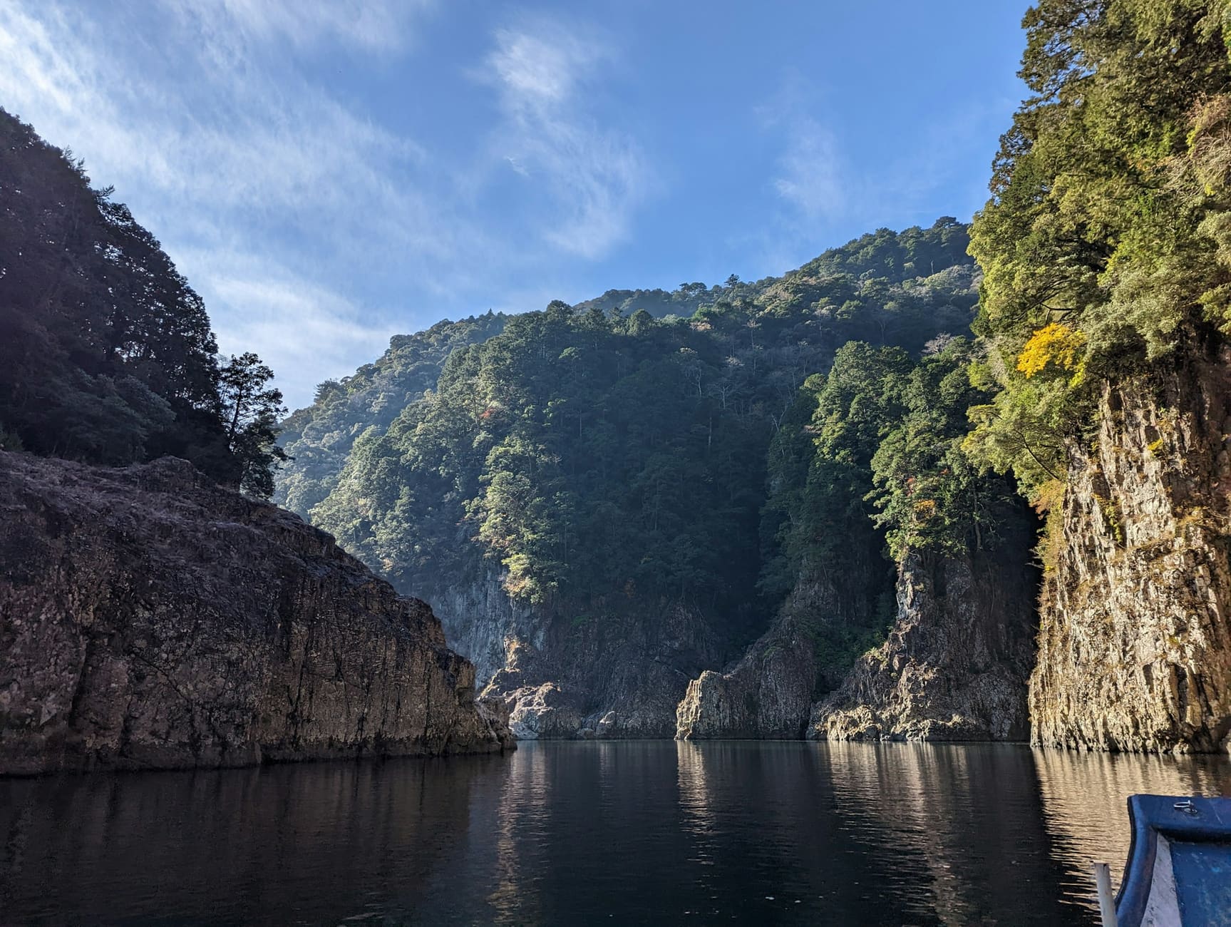 A river running through a forested gorge
