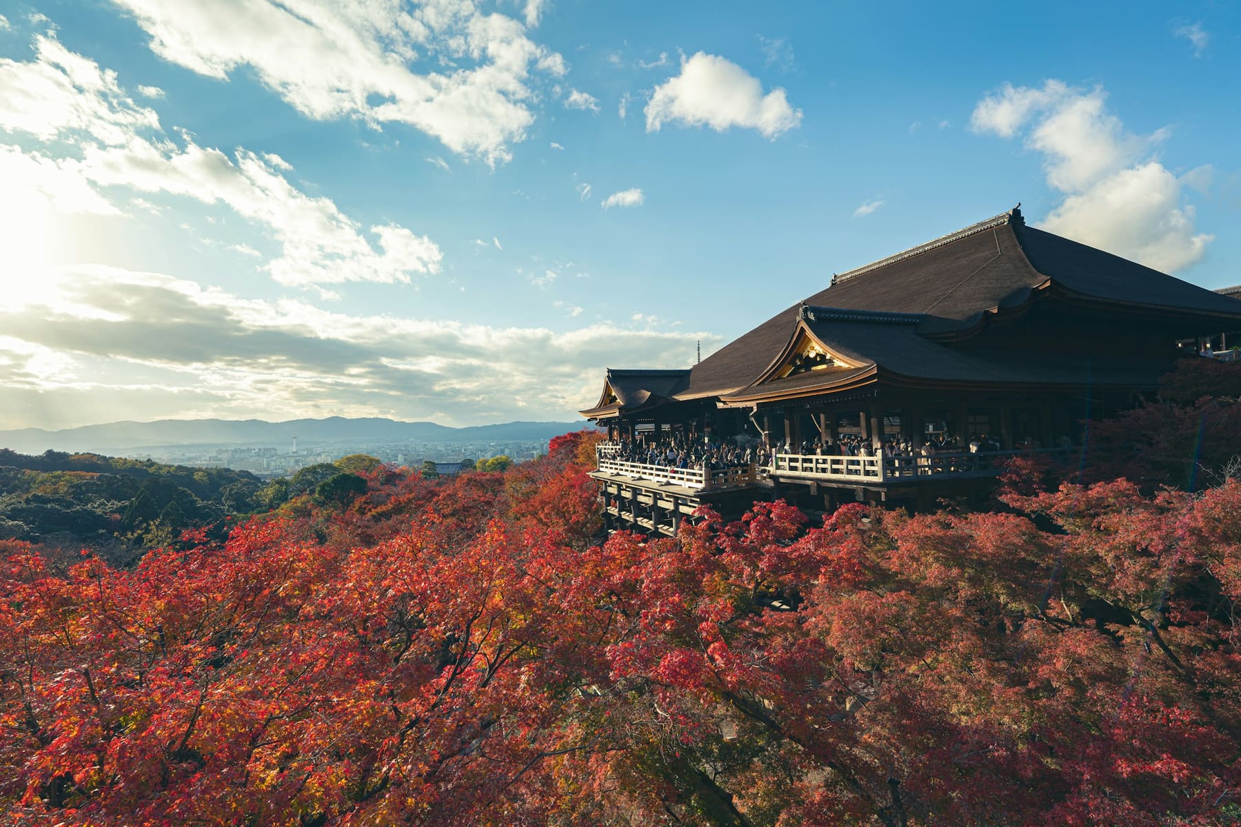 The wooden stage of Kiyomizu-dera above Kyoto in autumn