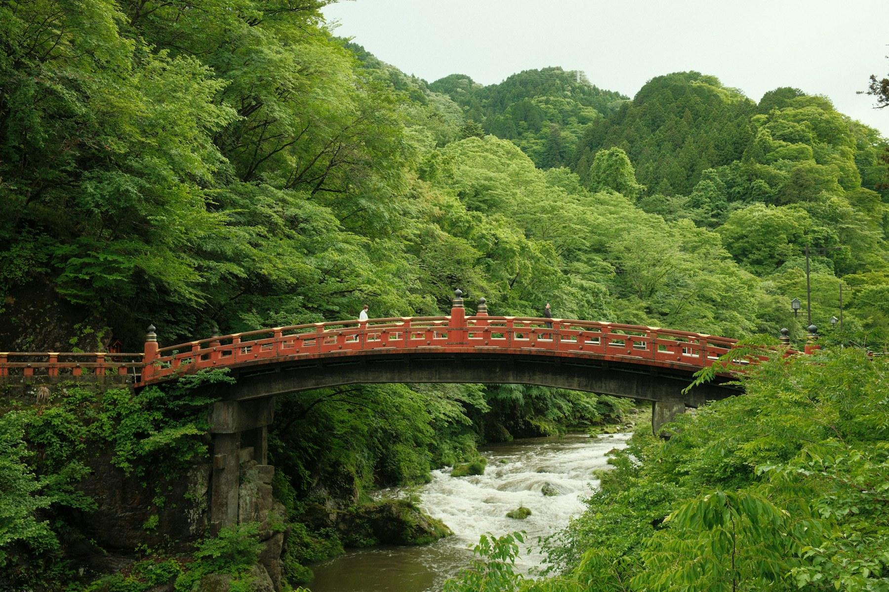 The red Shinkyo Bridge over the Daiya river in Nikko