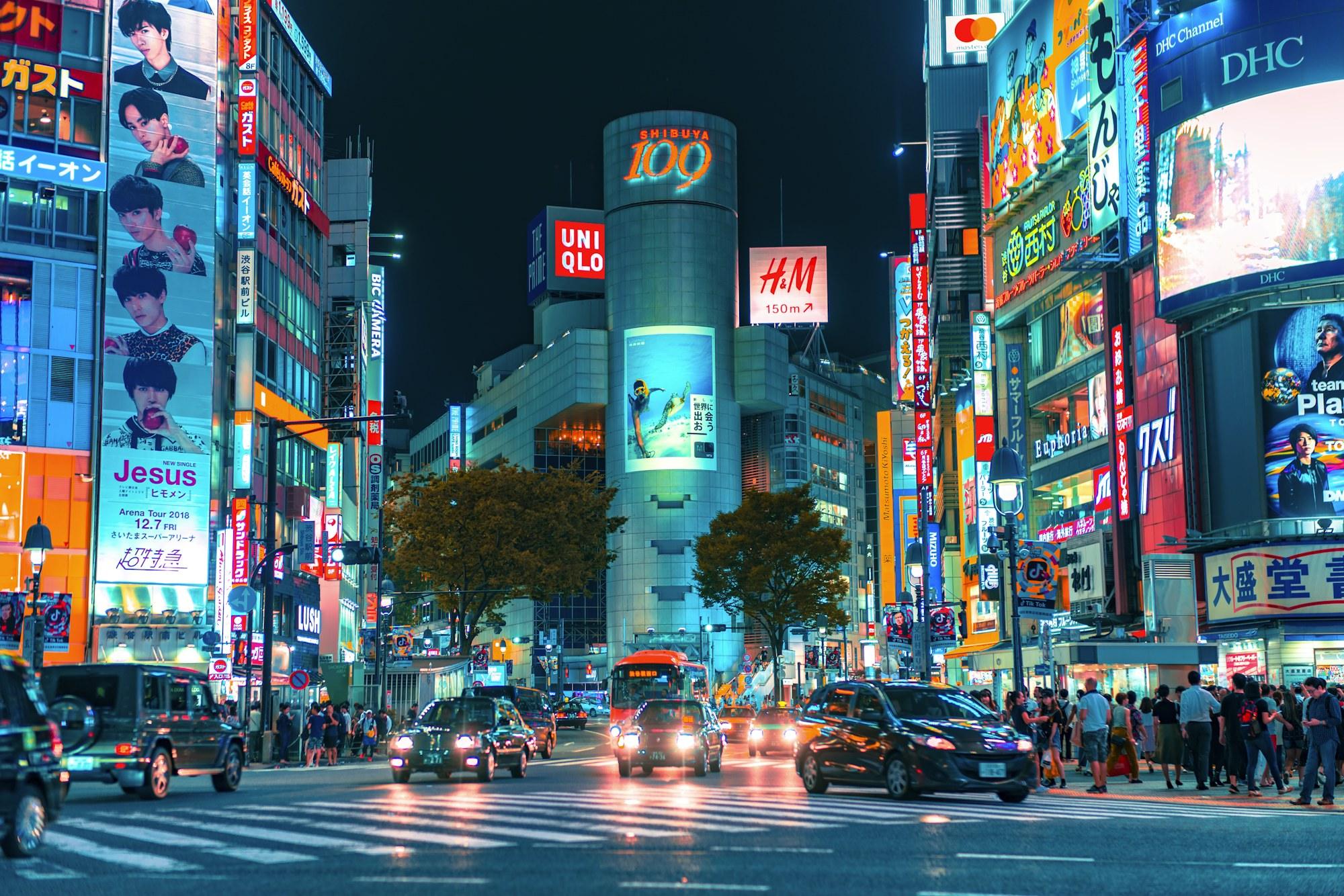 Shibuya Crossing lit up at night
